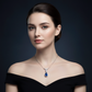 Lab Blue Sapphire Pear Halo Drop Pendant with V-Bar — Square Wear Shot