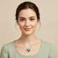 Lab Emerald Three-Stone Clover Pendant — Square Wear Shot