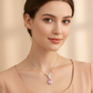 Lab Padparadscha Pear Halo Drop Pendant with Wing V-Bar — Square Wear Shot