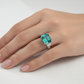Lab Paraiba Tourmaline Three-Stone Ring — AI Wear Shot
